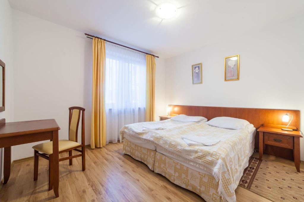 Трехместный (Апартаменты с 1 спальней и балконом (для 3 взрослых)) курортного отеля Olymp, Колобжег