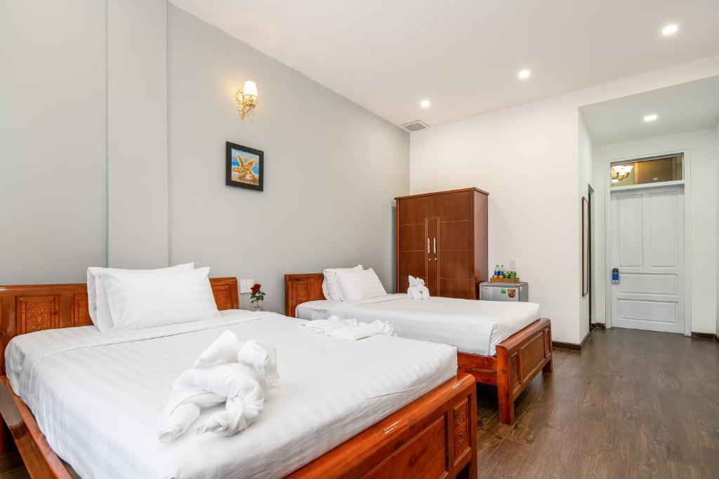 Двухместный (Улучшенный двухместный номер с 1 кроватью или 2 отдельными кроватями, вид на город) отеля Bamboo Hotel, Дананг
