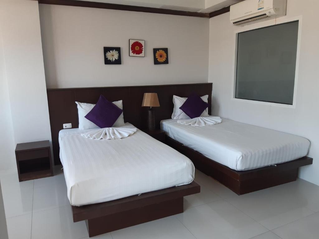 Двухместный (Улучшенный двухместный номер с 2 отдельными кроватями) гостевого дома Fruit Paradise Hotel, Пхукет
