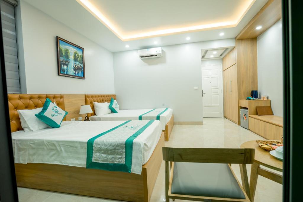 Четырехместный (Номер Делюкс с 2 кроватями размера «queen-size») отеля Green Tree Hotel Phú Quốc, Дуонг-Донг