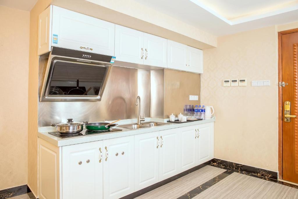 Апартаменты (Улучшенные апартаменты с 3 спальнями), Guangzhou Pengman Apartment Zhengjia Huanshi Branch