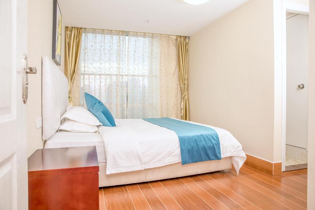 Апартаменты (Three-Bedroom Apartment (include airport pick up service)), Guangzhou Pengman Apartment Zhengjia Huanshi Branch