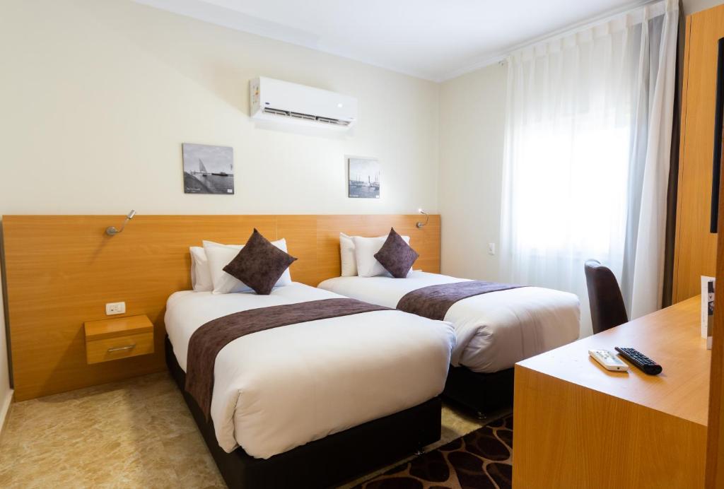 Двухместный (Стандартный двухместный номер с 2 отдельными кроватями и видом на сад) отеля Mercure Ismailia Forsan Island, Исмаилия