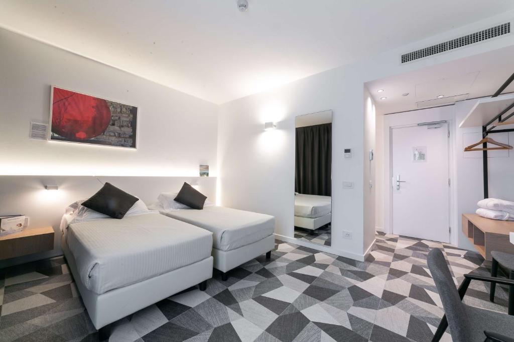Двухместный (Улучшенный двухместный номер с 2 отдельными кроватями) отеля Best Western Hotel Cappello d'Oro, Бергамо