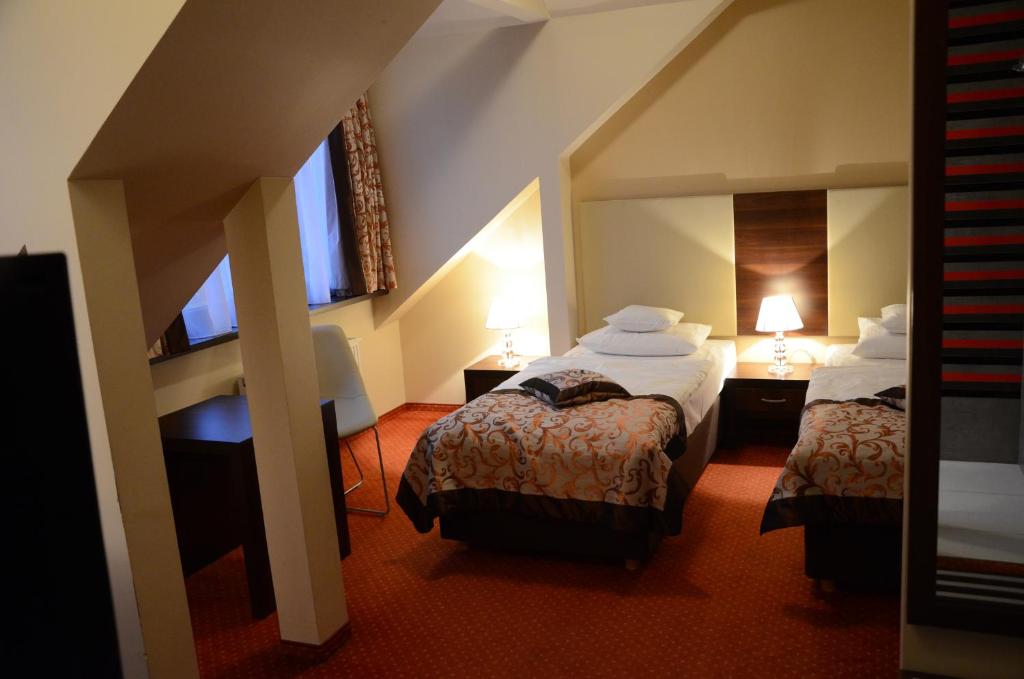 Двухместный (Двухместный номер «Комфорт» с 2 отдельными кроватями) отеля Agat Hotel, Лодзь