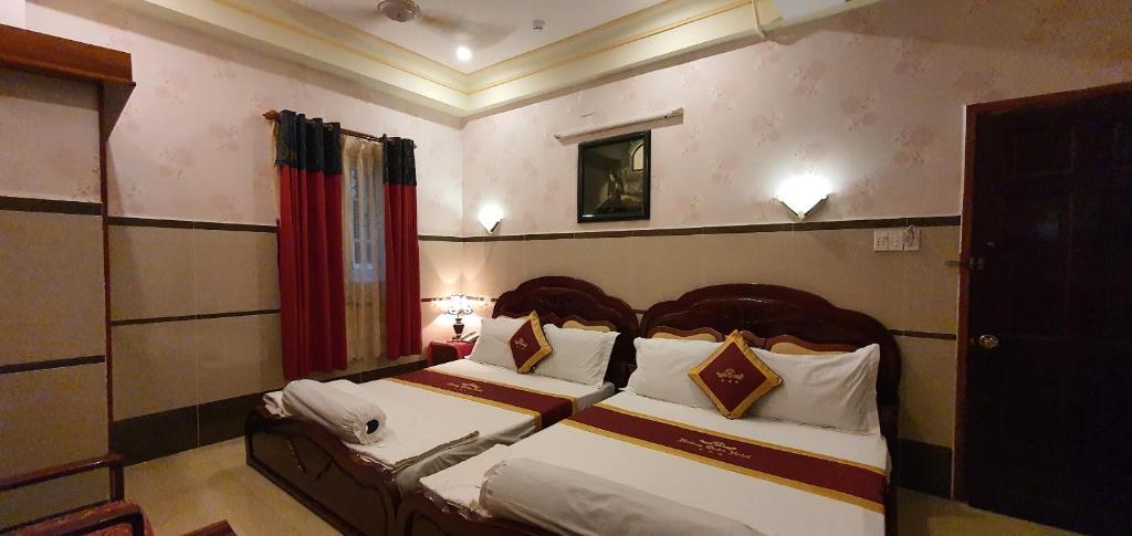 Семейный (Семейный номер Делюкс) отеля Hoàng Quân Hotel, Хошимин