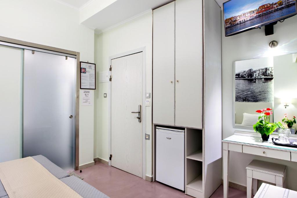 Двухместный (Двухместный номер эконом-класса с 2 отдельными кроватями - Верхний этаж) отеля Hotel Ideon, Ханья