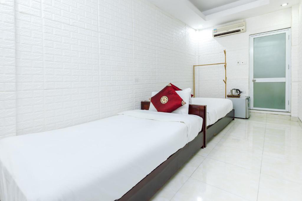 Двухместный (Стандартный двухместный номер с 2 отдельными кроватями) отеля OYO 604 Queen Hotel spot-on, Ханой