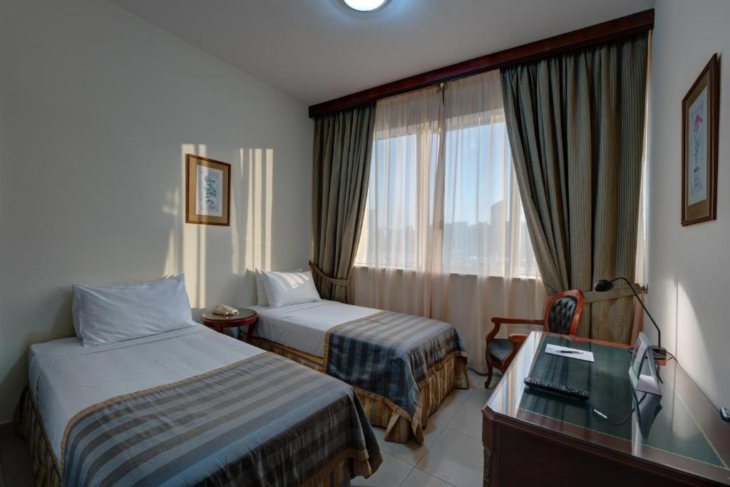 Двухместный (Двухместный номер Делюкс с 2 отдельными кроватями) апарт-отеля Mourouj Hotel Apartments by Mourouj Gloria, Абу-Даби