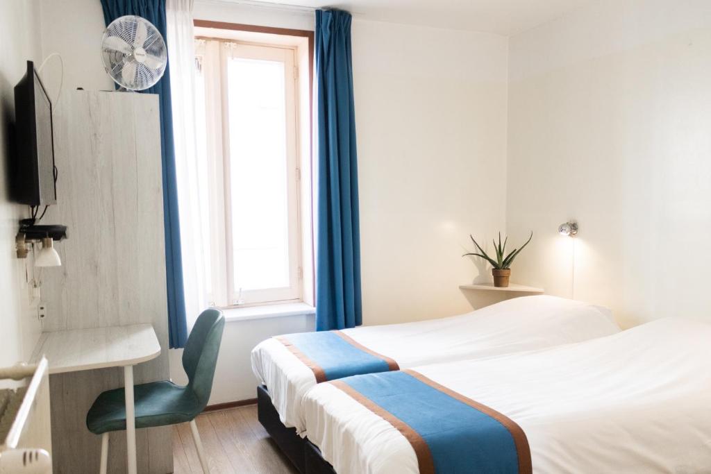 Двухместный (Двухместный номер с 2 отдельными кроватями) отеля Hotel Doria, Амстердам