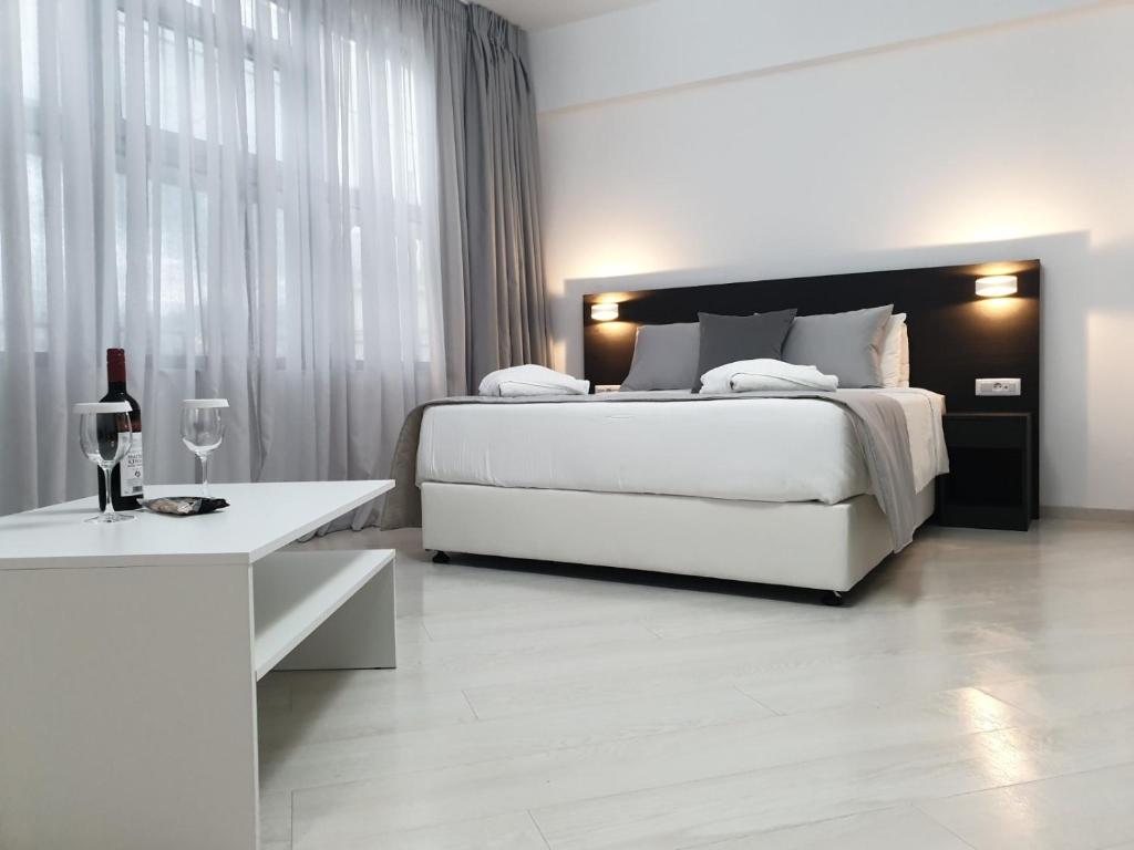 Двухместный (Улучшенный двухместный номер с 1 кроватью или 2 отдельными кроватями) отеля Boss Boutique Athens, Афины