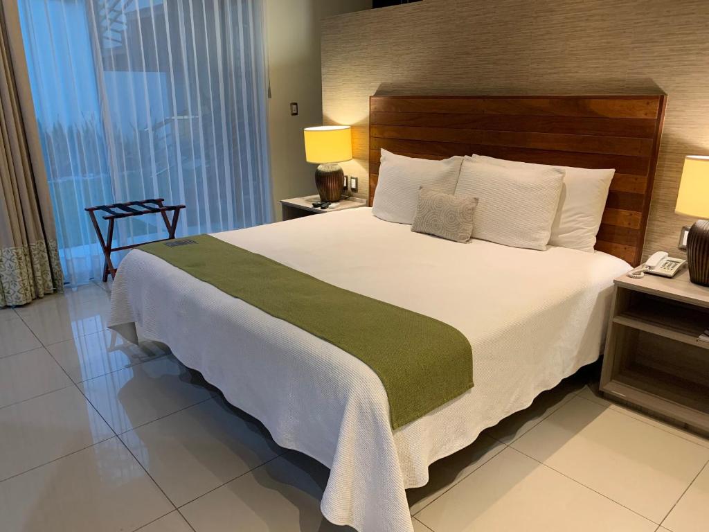 Двухместный (Улучшенный номер) отеля Amoe Hotel Boutique & Spa, Бока-дель-Рио