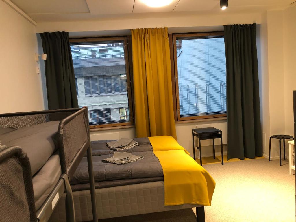 Семейный (Отдельный семейный номер с общей ванной комнатой), Aikatalo Mini Hotel Helsinki City Center