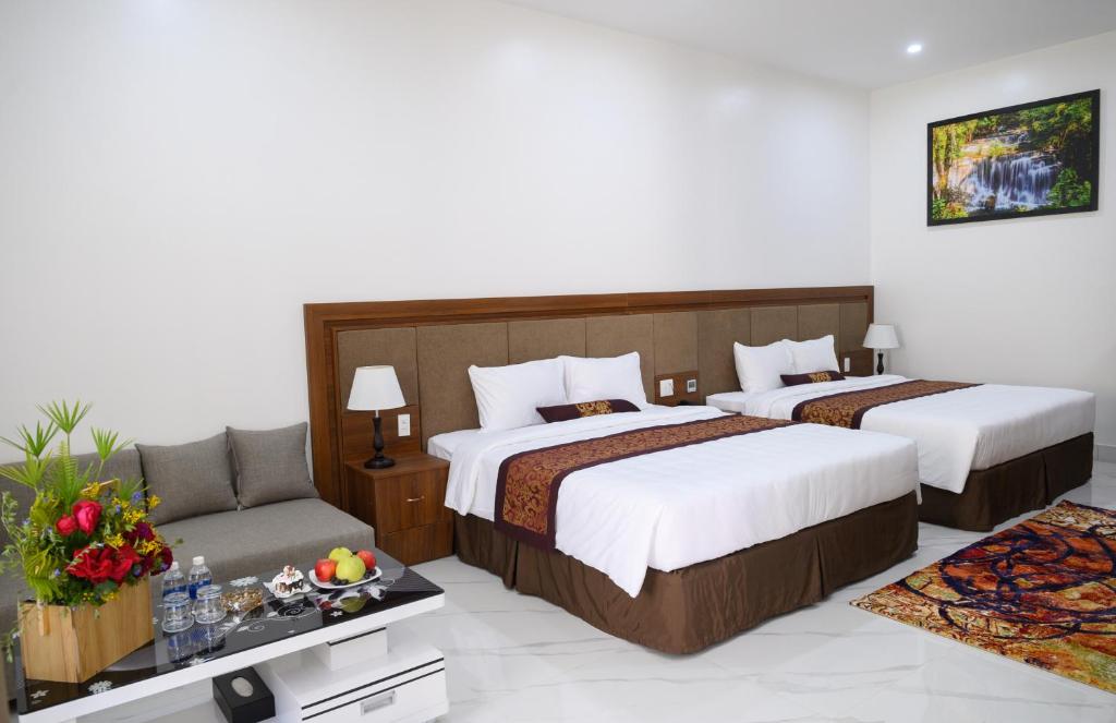 Двухместный (Большой двухместный номер с 1 кроватью или 2 отдельными кроватями) отеля Nhat Quang Hotel, Баолок