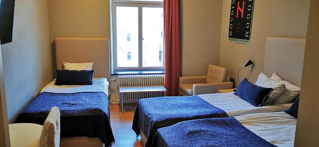 Трехместный (Трехместный номер с собственной ванной комнатой) отеля Sundsvall City Hotel & Hostel, Сундсвалль