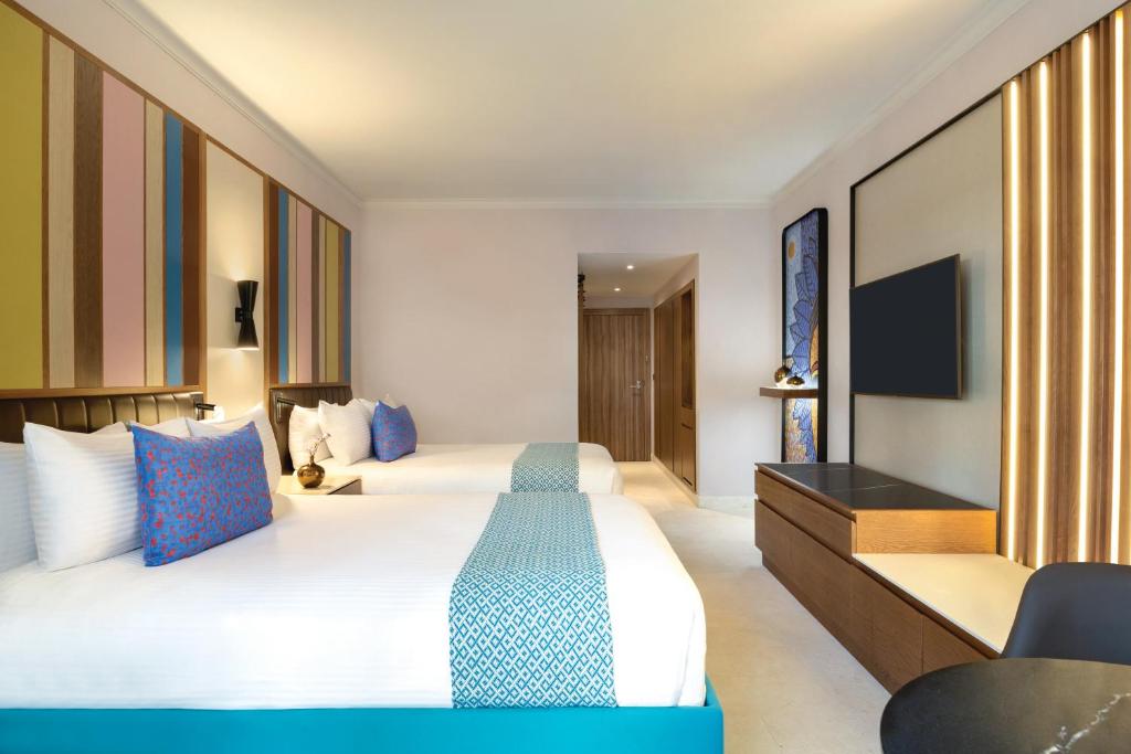 Двухместный (Двухместный номер с 1 кроватью, вид на сад) курортного отеля Hilton La Romana All- Inclusive Adult Resort & Spa Punta Cana, Байяибе