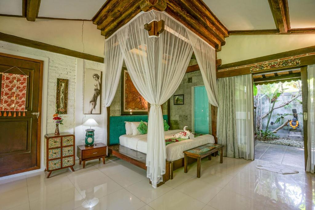 Двухместный (Двухместный номер Делюкс с 1 кроватью и балконом) курортного отеля KTS Authentic Balinese Villas, Чангу