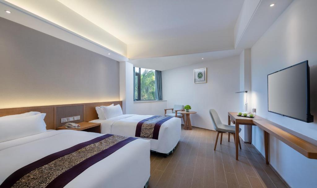 Двухместный (Элегантный двухместный номер с 2 отдельными кроватями, вид на сад) отеля Sanya South China Hotel, Санья