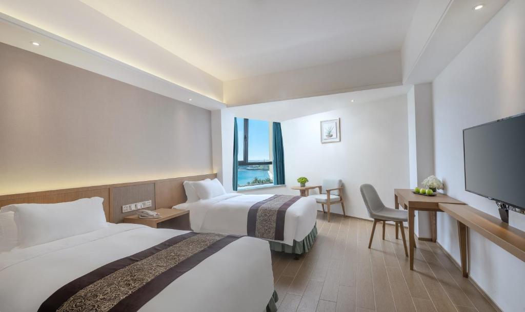 Двухместный (Элегантный двухместный номер с 2 отельными кроватями, вид на море) отеля Sanya South China Hotel, Санья