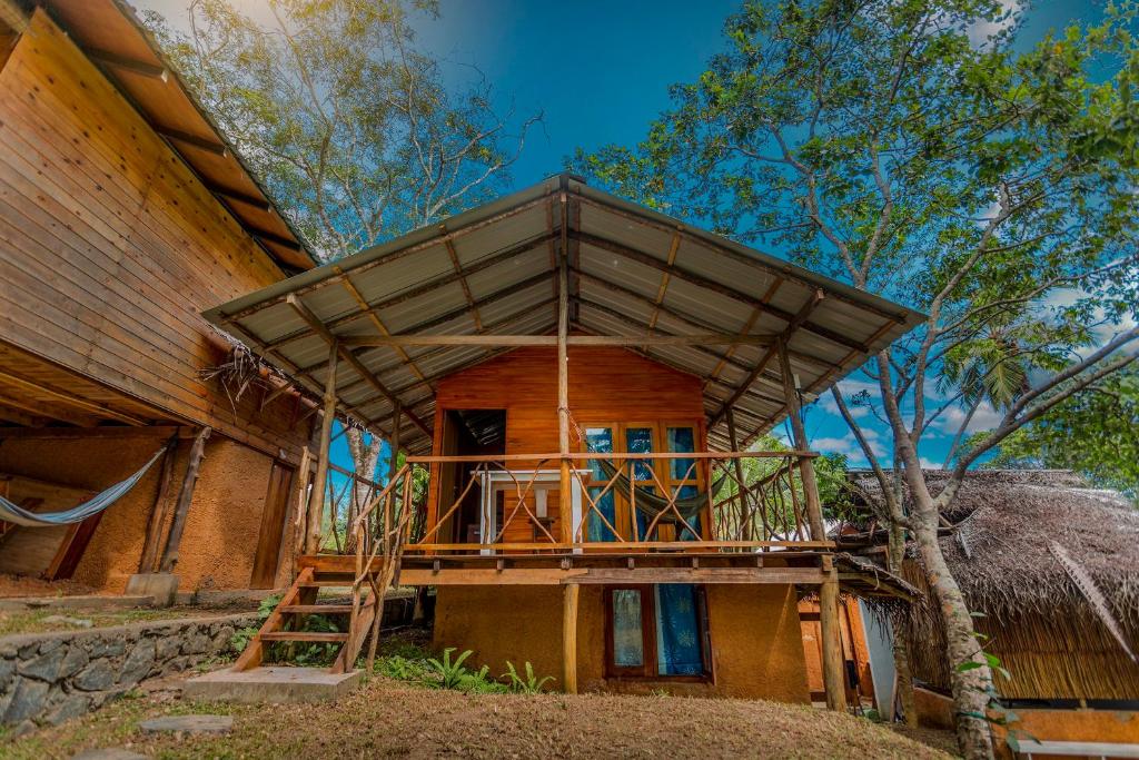 Отель Sea View Tree Lodge, Диквелла