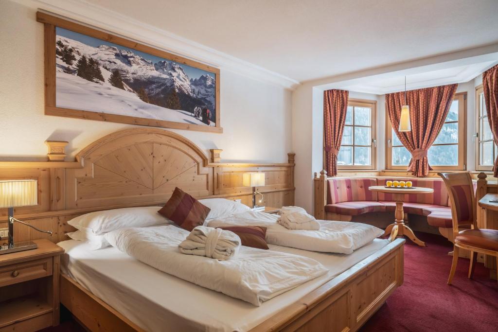 Двухместный (Двухместный номер Делюкс с 1 кроватью или 2 отдельными кроватями) отеля Sporthotel Romantic Plaza, Мадонна-ди-Кампильо