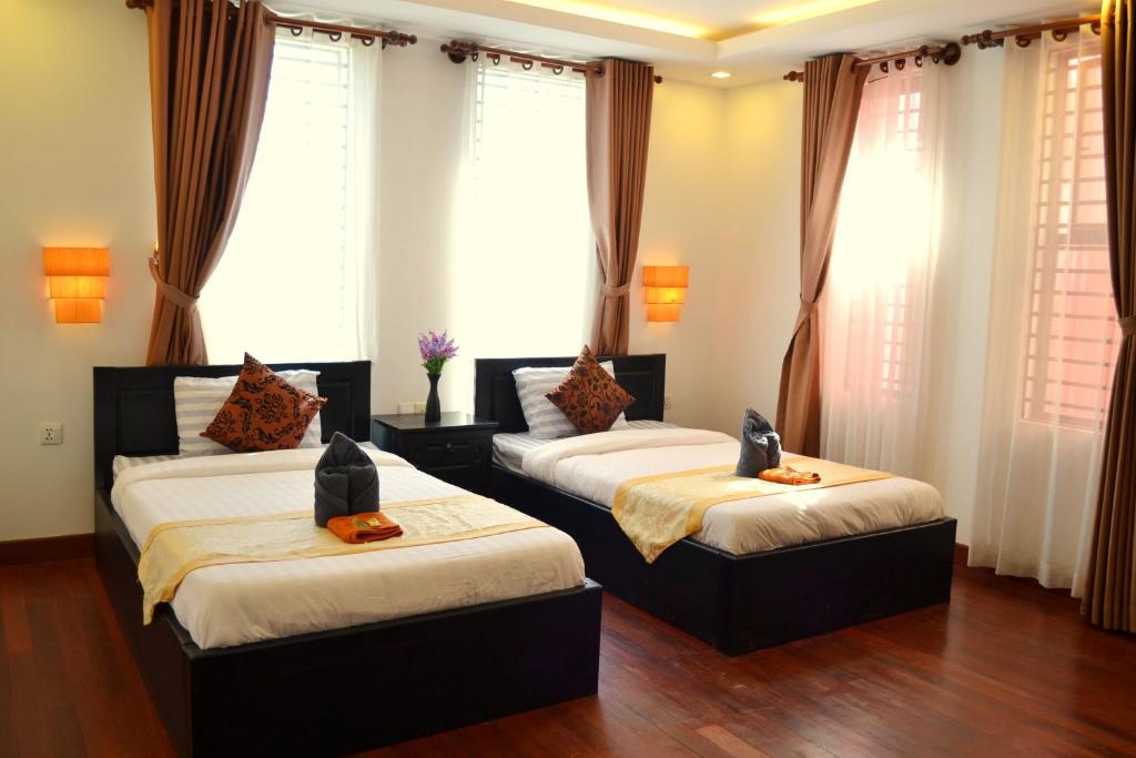 Двухместный (Просторный двухместный номер с 2 отдельными кроватями) отеля Baan Soksan, Сием Рип