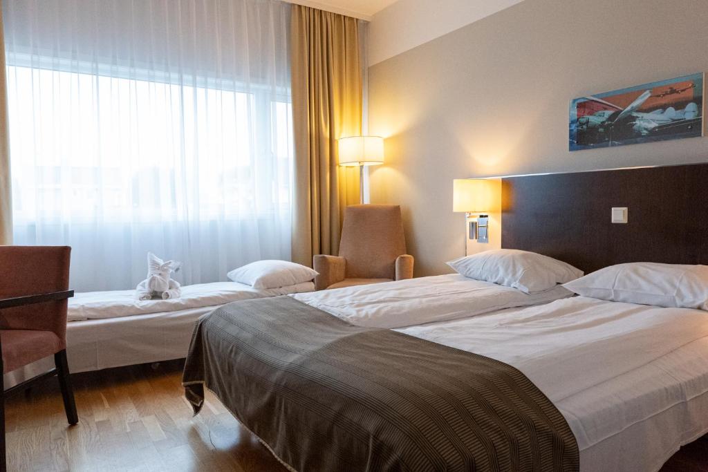 Трехместный (Двухместный номер с 2 отдельными кроватями и дополнительной кроватью) отеля Quality Airport Hotel Stavanger, Ставангер