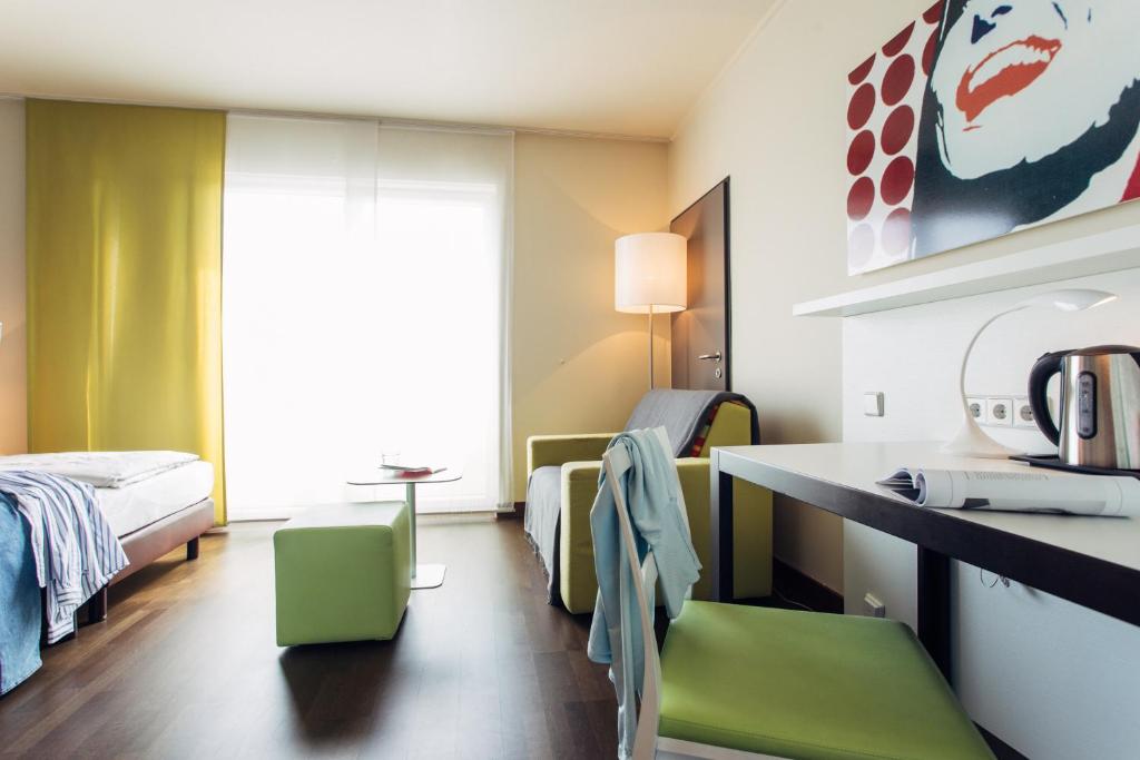 Двухместный (Двухместный номер с 1 кроватью или 2 отдельными кроватями) отеля Harry's Home Linz Hotel & Apartments, Линц