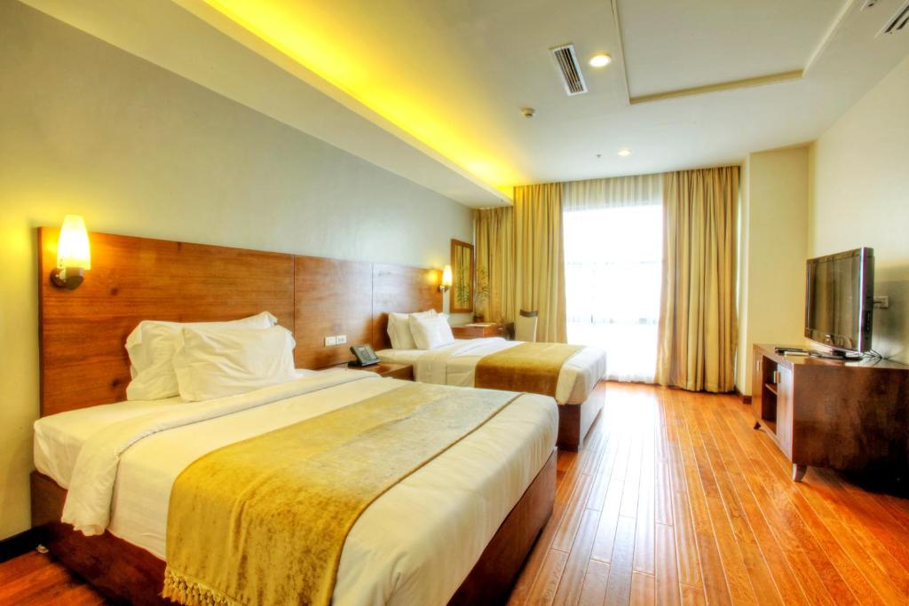 Двухместный (Двухместный номер «Премиум» с 1 кроватью или 2 отдельными кроватями) отеля Armada Hotel Manila, Манила