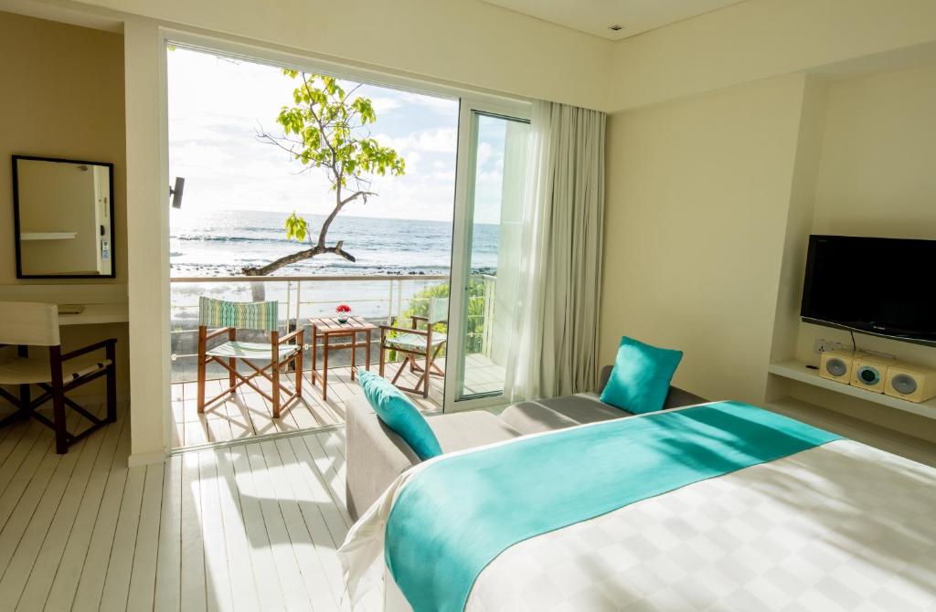Номер (Пляжная вилла, вид на море) курортного отеля Holiday Inn Resort Kandooma Maldives, Гурайдо