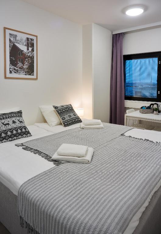 Двухместный (Двухместный номер с 1 кроватью или 2 отдельными кроватями и окном — Общая ванная комната) хостела Inn Tourist Hotel & Hostel, Хельсинки
