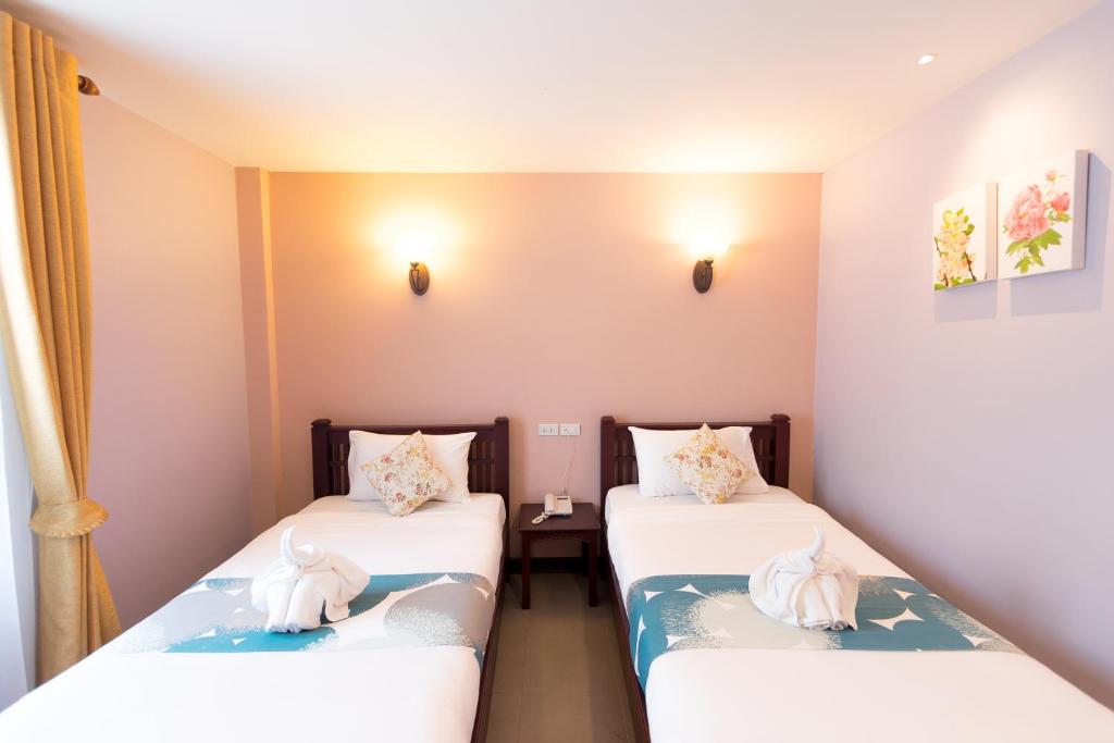 Двухместный (Улучшенный двухместный номер с 2 отдельными кроватями) отеля La Villa Boutique hotel, Сакэу