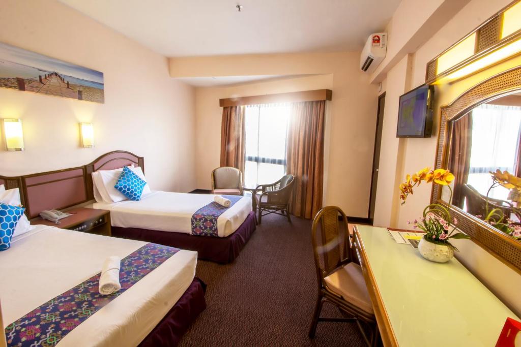 Двухместный (Двухместный номер «Премиум» с 2 отдельными кроватями) отеля Hotel Grand Continental Langkawi, Лангкави