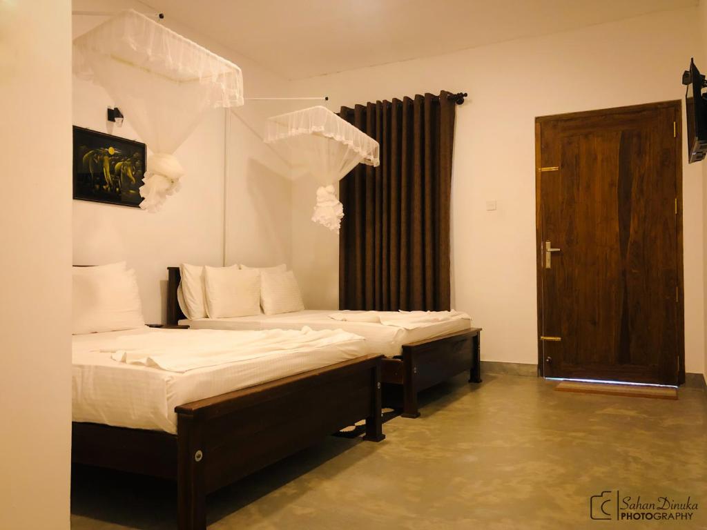 Двухместный (Стандартный двухместный номер с 2 отдельными кроватями) курортного отеля Hantara Udawalawa, Удавалаве