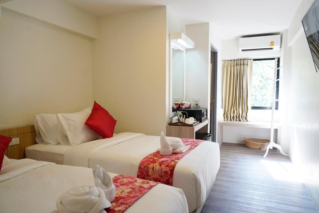 Двухместный (Улучшенный двухместный номер с 2 отдельными кроватями) отеля Wild Orchid, Бангкок