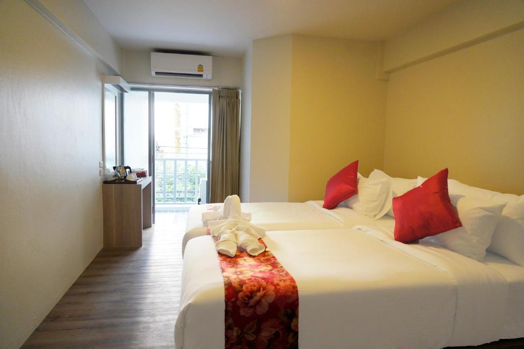 Двухместный (Двухместный номер Делюкс с 2 отдельными кроватями и балконом) отеля Wild Orchid, Бангкок