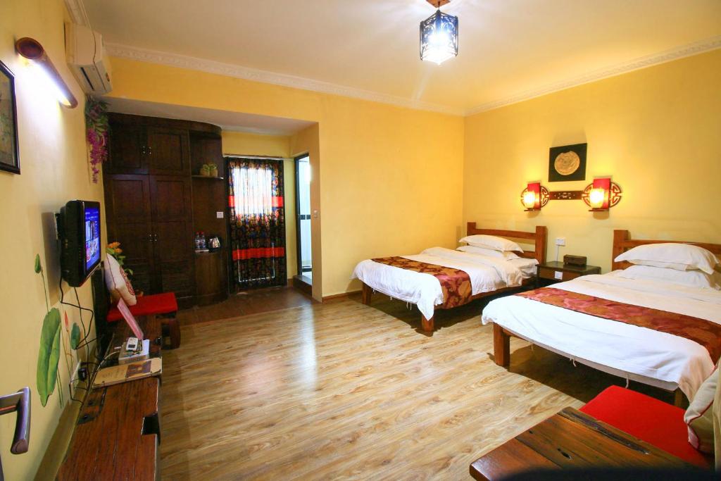 Двухместный (Стандартный двухместный номер с 2 отдельными кроватями) отеля Yangshuo Hidden Dragon Villa, Яншо
