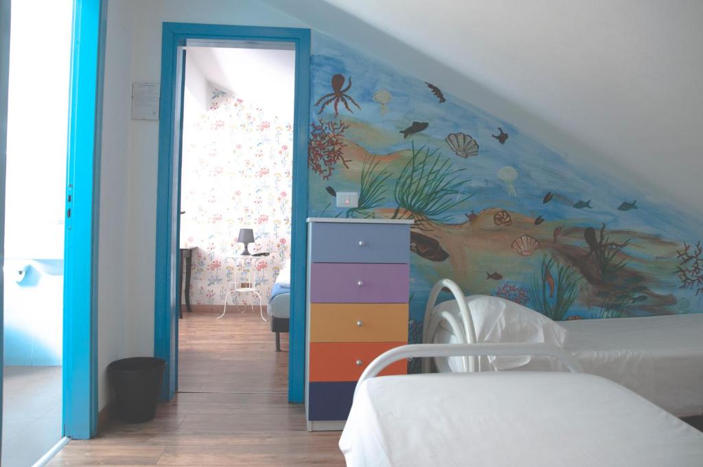 Четырехместный (Четырехместный номер с собственной ванной комнатой и балконом) хостела City-In Hostel B&B, Катания