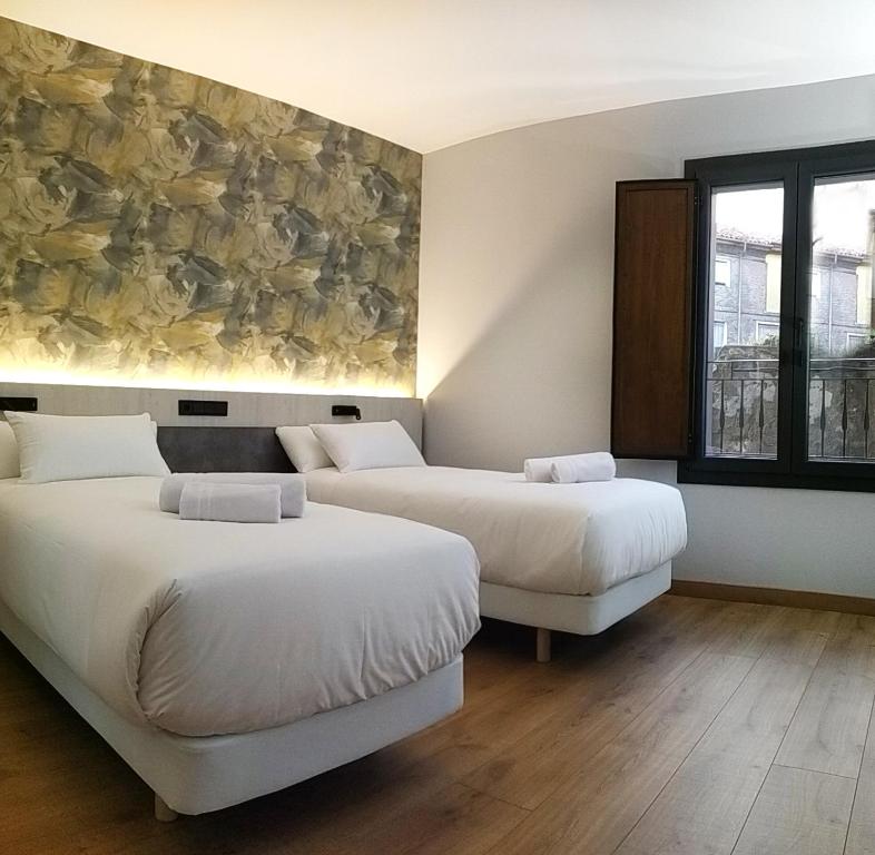 Двухместный (Улучшенный двухместный номер с 1 кроватью или 2 отдельными кроватями) отеля Hotel NERU con Encanto, Леон