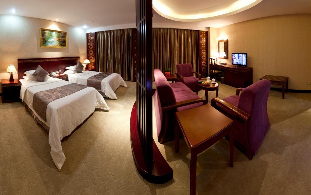 Двухместный (Двухместный номер Делюкс с 2 отдельными кроватями) отеля Bliss International Hotel, Вэйхай