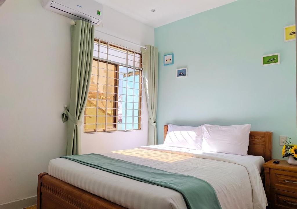 Двухместный (Двухместный номер Делюкс с 1 кроватью) семейного отеля Mint Homestay Nha Trang, Нячанг