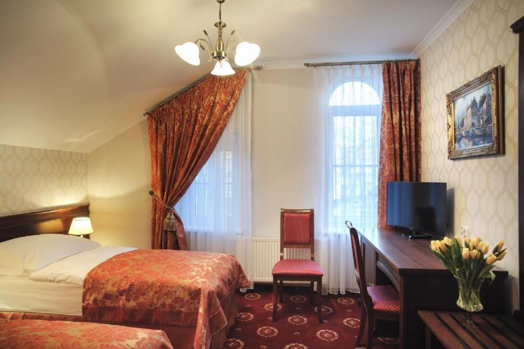 Двухместный (Двухместный номер с 2 отдельными кроватями) отеля Hotel Kopernik, Цехоцинек