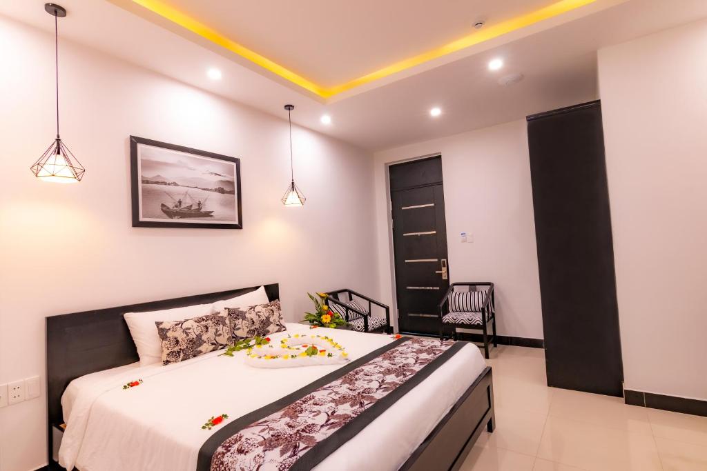 Двухместный (Улучшенный двухместный номер с 1 кроватью) отеля Hoianation Villas Hotel, Хойан