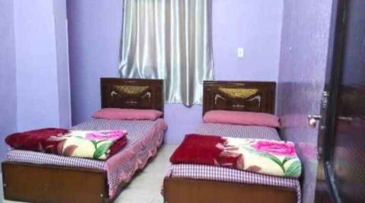 Двухместный (Двухместный номер с 2 отдельными кроватями и общей ванной комнатой) гостевого дома El-amin Guest House, Асуан