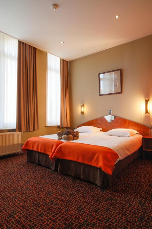 Двухместный (Двухместный номер «Комфорт» с 2 отдельными кроватями) отеля Hotel Grupello, Брюссель