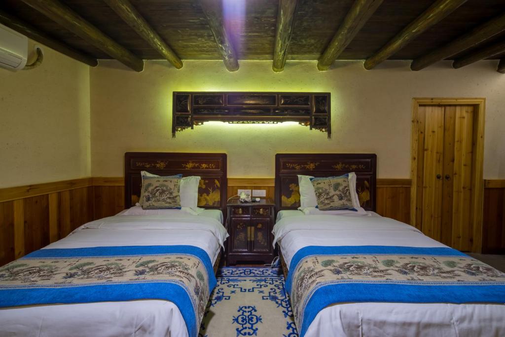 Семейный (Семейный люкс с 2 спальнями), Yangshuo Ancient Garden Boutique Hotel