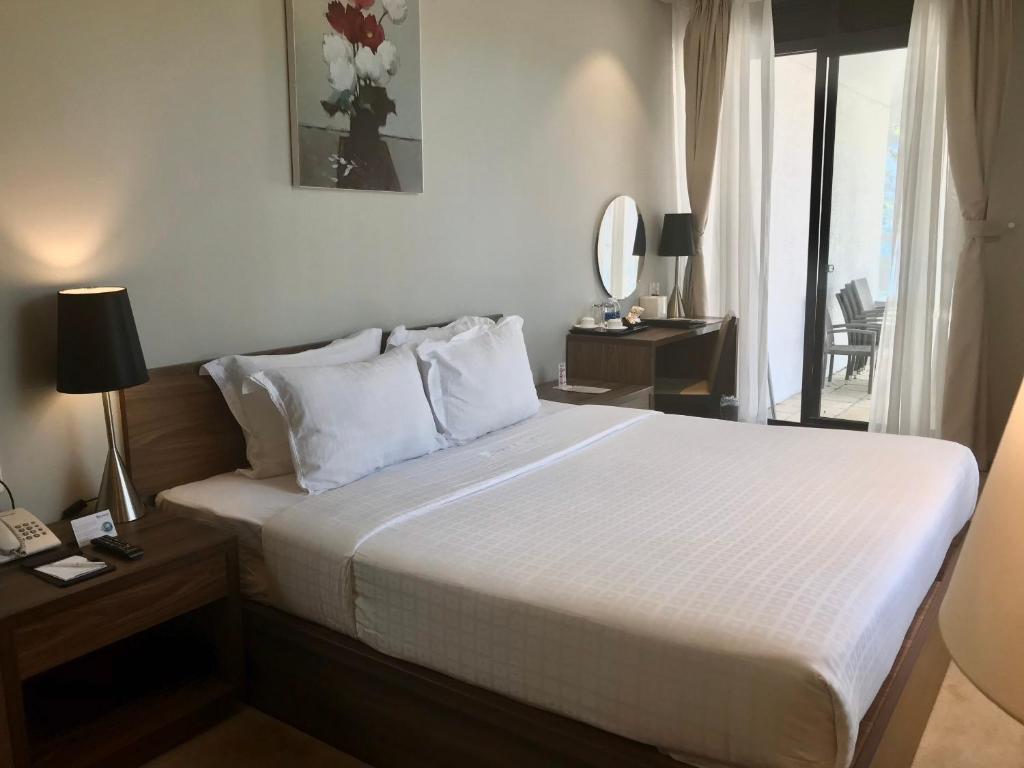 Двухместный (Классический номер с кроватью размера «king-size») курортного отеля Terracotta Hotel & Resort Dalat, Далат