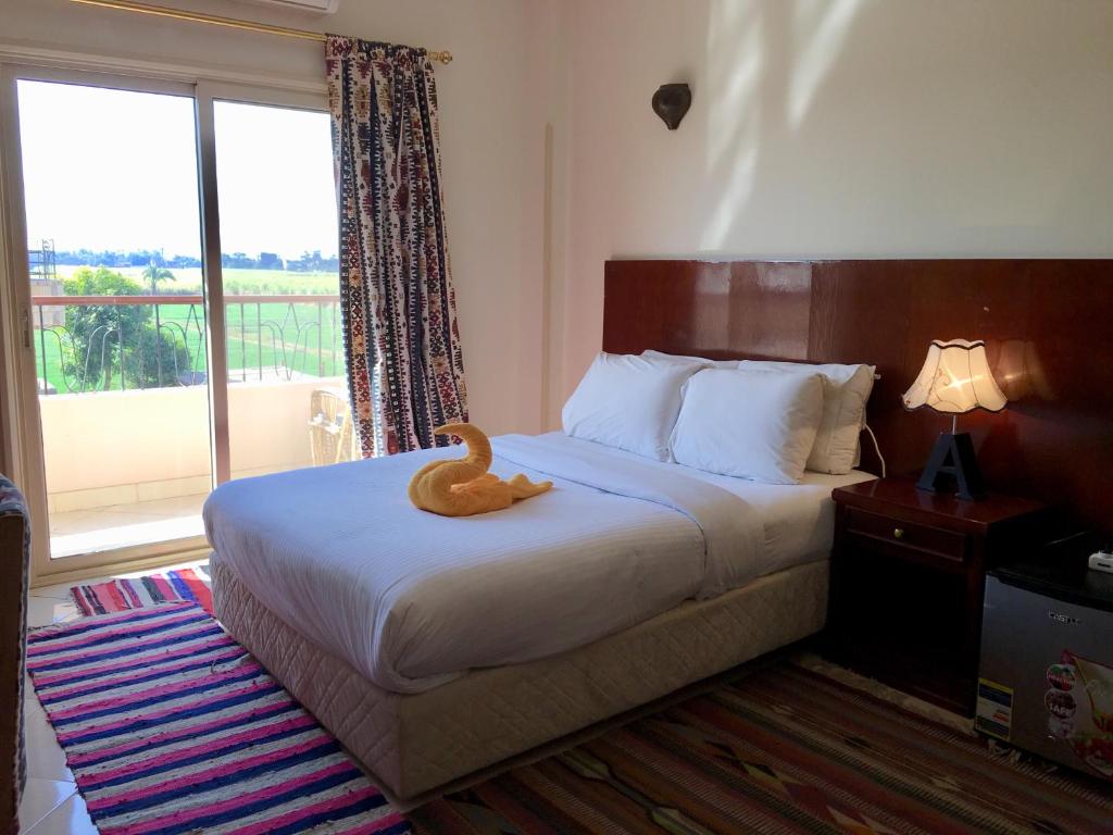 Двухместный (Двухместный номер с 1 кроватью, вид на сад) отеля New Memnon Hotel, Луксор
