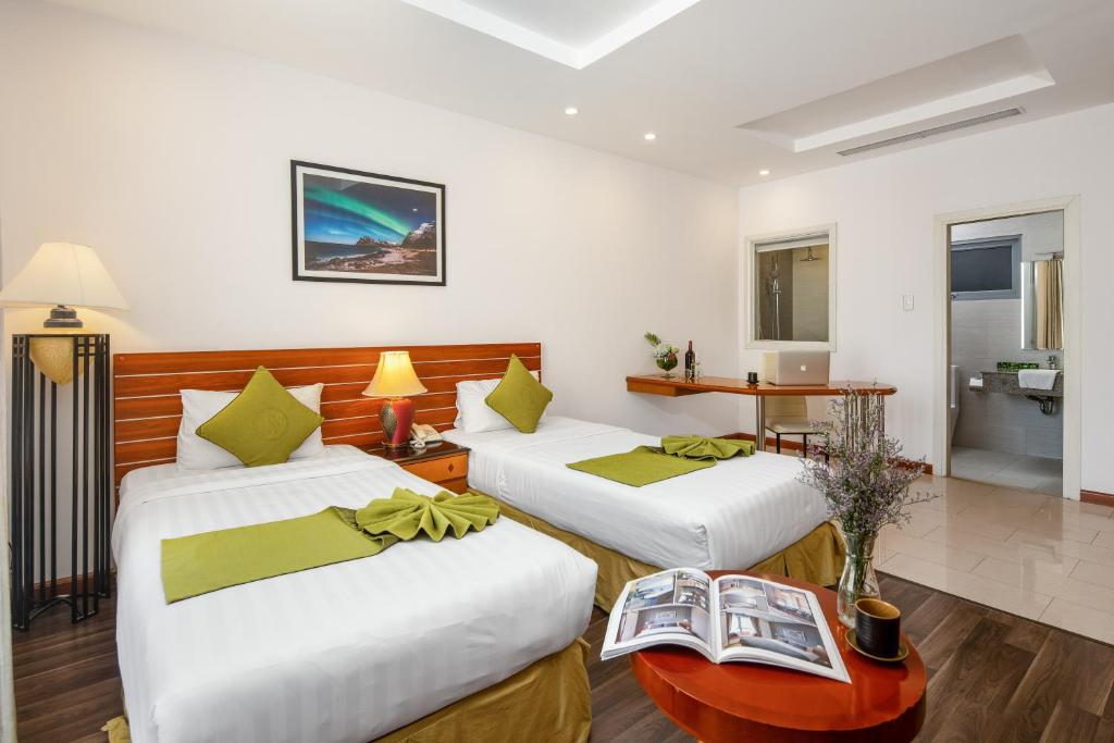 Двухместный (Двухместный номер Делюкс с 2 отдельными кроватями и видом на сад) апарт-отеля Richico Apartments And Hotel, Дананг