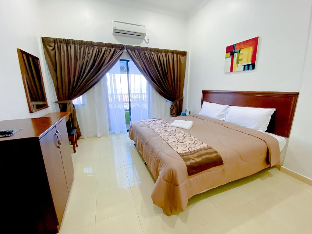 Двухместный (Номер Делюкс с кроватью размера «king-size») отеля Hotel & Chalet Sportfishing PNK Teluk Bahang, Пенанг